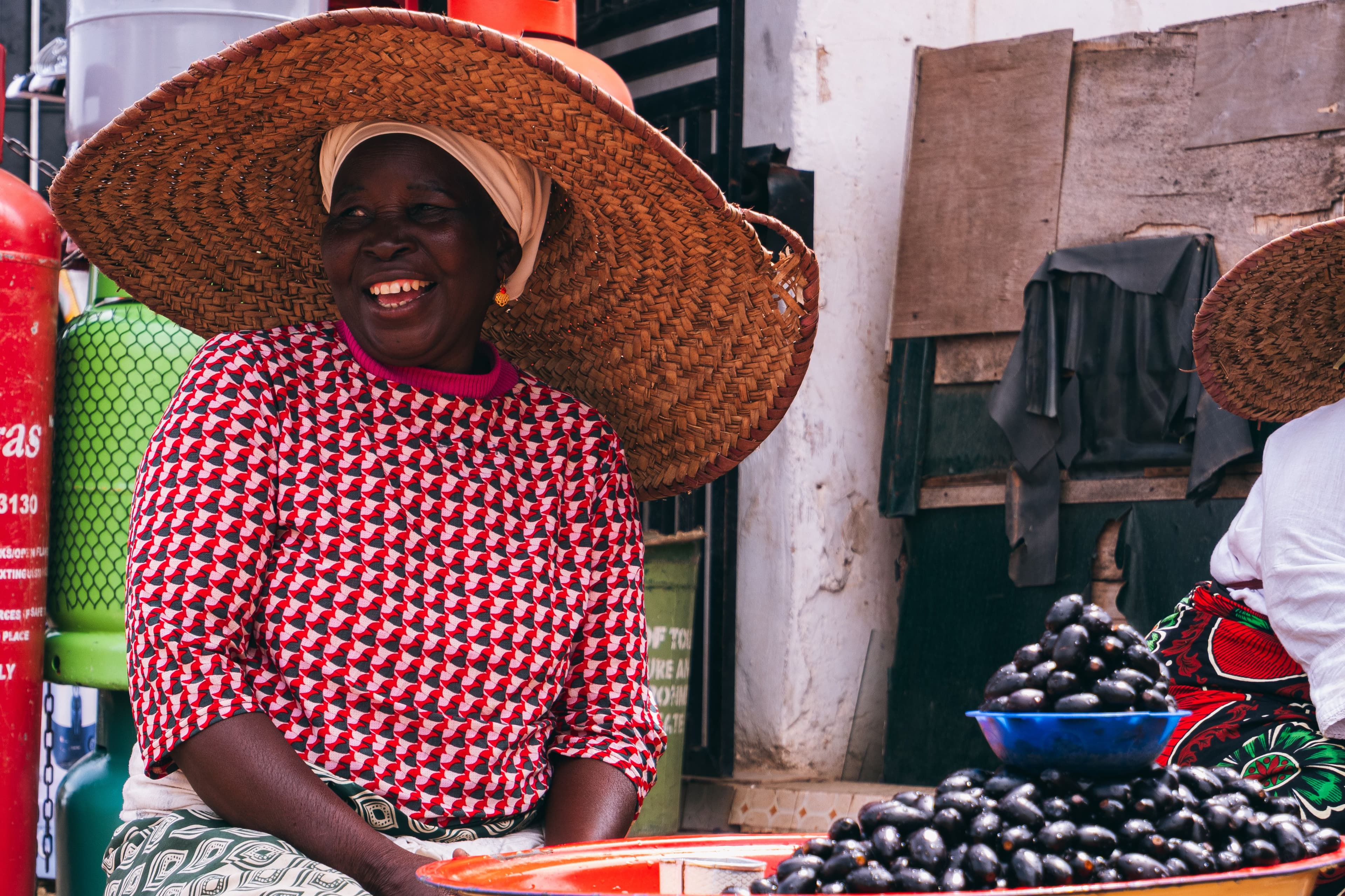 African market vendor with fresh produce